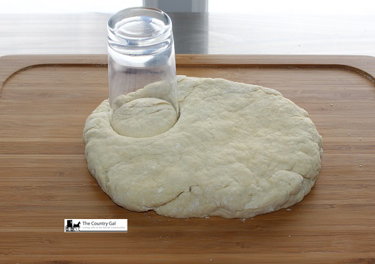 cut dough with glass biscuits